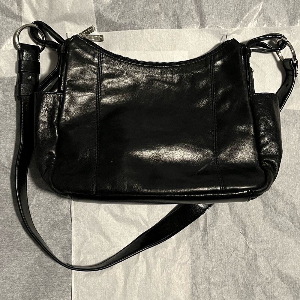 MADISON STUDIO BLACK LEATHER BAG WITH ADJUSTABLE STRAP. EXCELLENT CONDITION